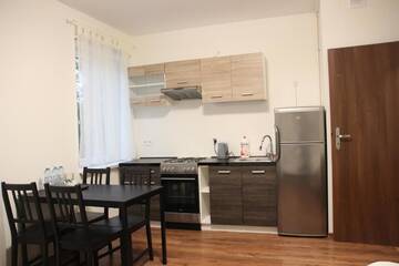 Фото номера Люкс Проживание в семье Fredry 8 г. Piastów 4